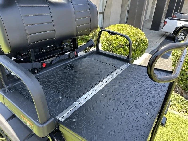 Rear seat folded down into a cargo deck