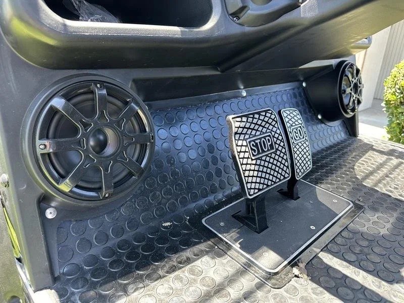 Bluetooth speaker mounted in the golf cart